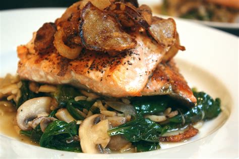 Drizzle top of each salmon fillet with 1 tsp of the olive oil mixture and season top with salt and pepper to taste. savory nest: Pan-seared Salmon over Wilted Spinach with ...