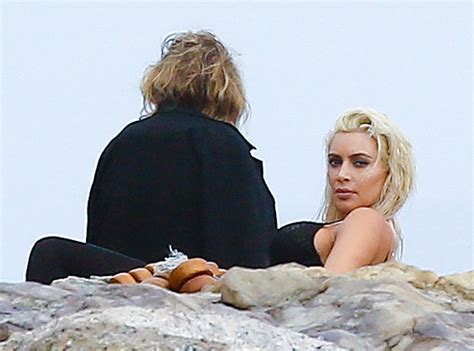 Kim Kardashian Has A Sexy Photo Shoot In A Bra On The Beach—see The