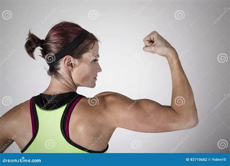 Woman Flexing Muscles Royalty Free Stock Photo