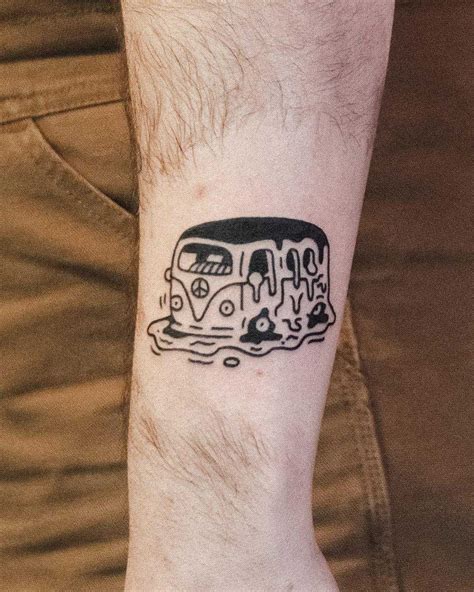 melting bus tattoo by tattooist bongkee inked on the left forearm