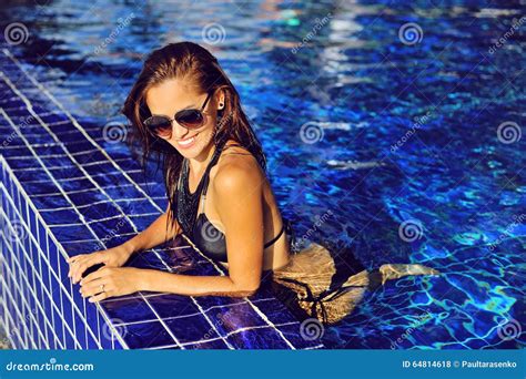 Fashion Woman In Sunglasses Relaxing In The Pool Stock Photo Image Of