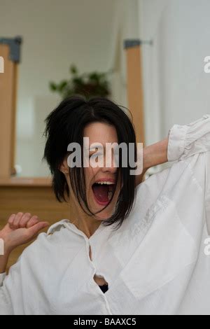 A gaping woman Gähnende Frau Stock Photo Alamy