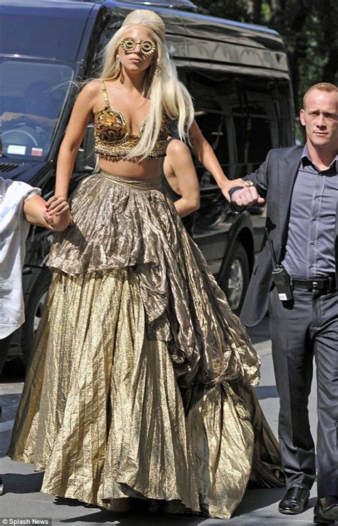 Lady Gagas Bodyguard Carries Her Photoshoot As Shes Unable To Walk In