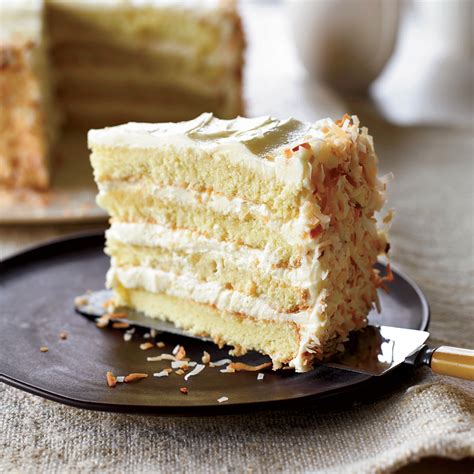 Trace the bottoms of the pans on parchment paper, then use scissors to cut out two circles just the right size to fit into the bottom of each pan. Towering Coconut Layer Cake Recipe - Tyler Florence | Food ...