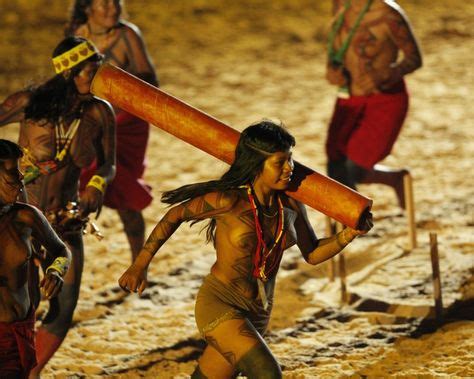 Brazilian Indigenous Woman dancing on ritual Xingú Brazil People