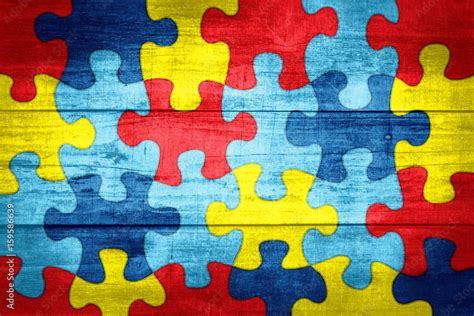 Illustrazione Stock Puzzle Pieces In Autism Awareness Colors Background