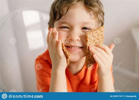 Cute Little Boy Eats Crispbread Healthy Lifestyle And Nutrition