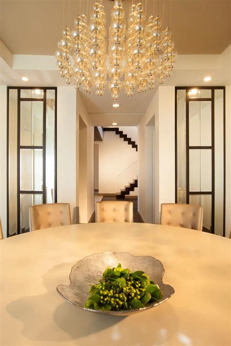 Bright Contemporary Dining Room With Pendant Chandelier