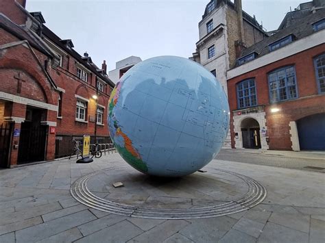 In Photos The Giant Upside Down Globe In Holborn London