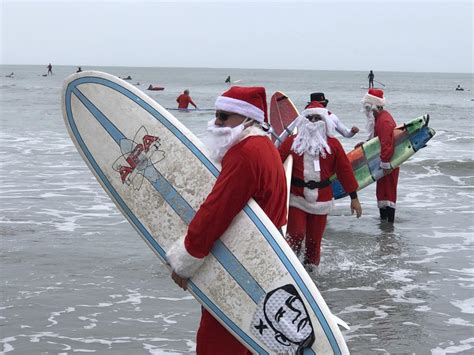 Surfing Santas Hang Ten For The Holidays On Floridas Space Coast