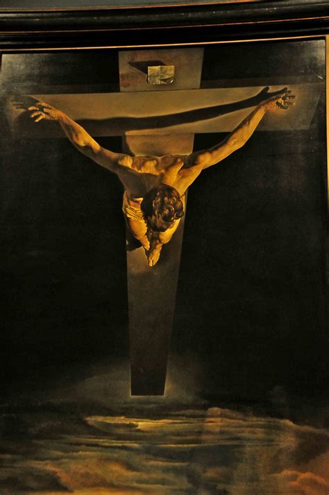The Crucifix Is Painted In Gold And Black