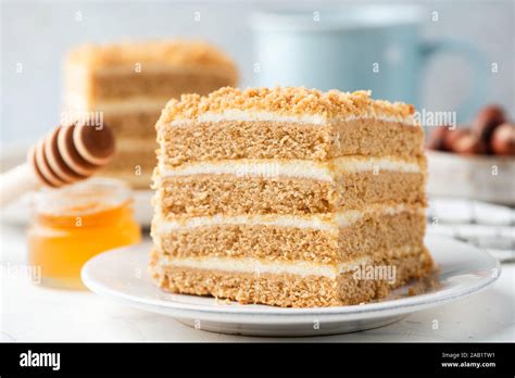 russian honey layer cake medovik slice closeup view biscuit honey layers with pastry cream