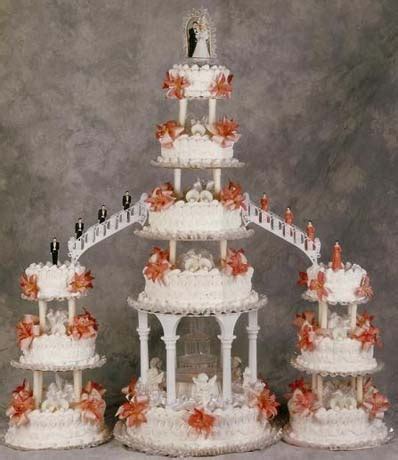 Three Tiered Wedding Cake With Orange Flowers