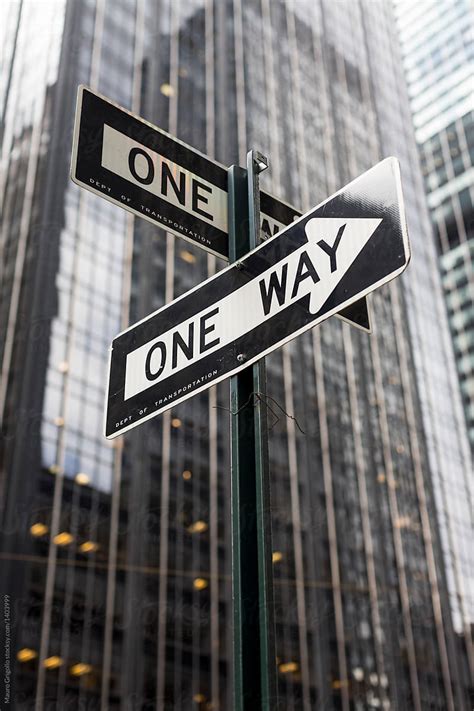 One Way Sign In Wall Street New York By Stocksy Contributor Mauro