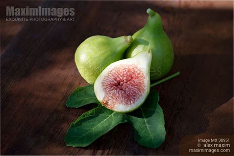 Photo Of Organic Freshly Picked Ripe Kadota Figs On A Fig Leaf Food