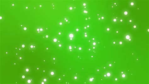 Sparkly Gold And Silver Light Particles Moving Across A Green Gradient Background Stock Footage