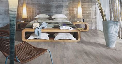 Adrian stainmaster carpet made into a 9x7 area rug, style: Grey oak laminate flooring in contemporary bedroom | Oak ...