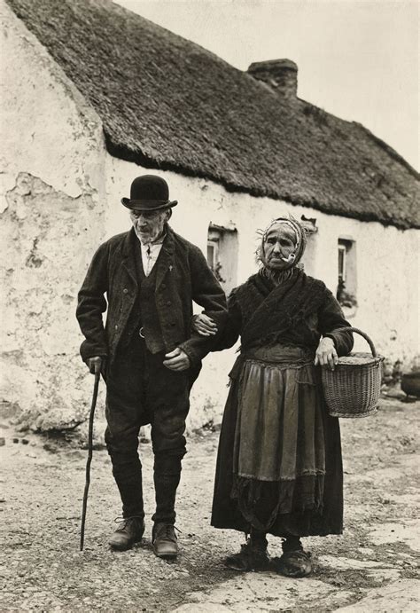An Elderly Couple Walk To The Market In Galway Ireland Circa 1915