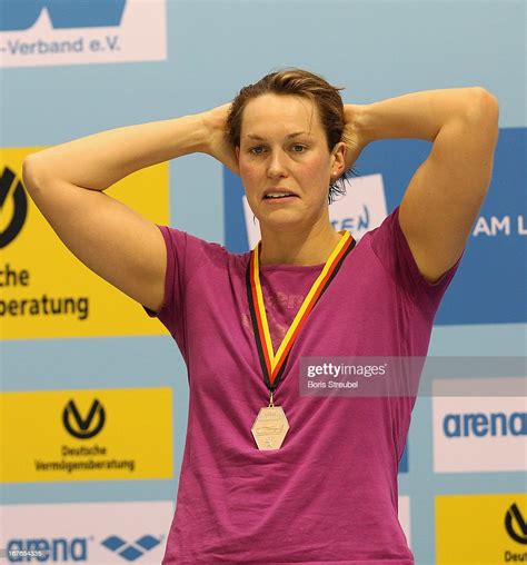 jenny mensing of sc wiesbaden reacts on the podium after winning the news photo getty images
