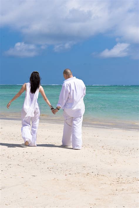 Couple Holding Hands On The Beach Stock Image Image Of Bride Holding