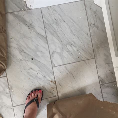 Adding a white or light gray grout color to the tile will highlight the pattern you have created with the tile. Classic Style Home: Grout Crisis Averted