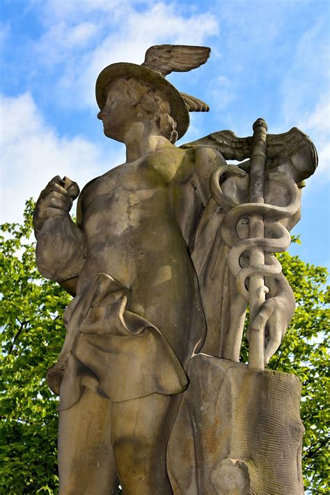 Mercury Statue At Børsen In Copenhagen Denmark Encircle