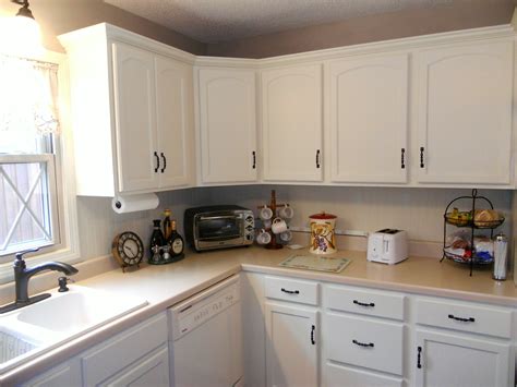 Here's our oak kitchen update on a budget! antique_white_painted_kitchen_cabinets_after_jan_2016_05 ...
