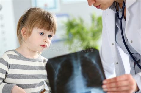 Kid Patient In Having Doctors Appointment Stock Photo Image Of