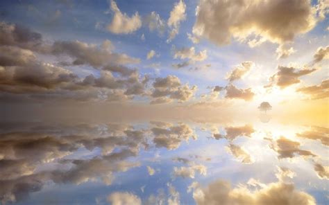 Download An Idyllic Sky Of Heavenly Clouds Wallpaper