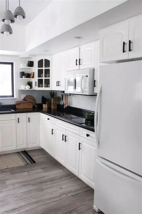 A stylish black and white kitchen by sara ray interior design combines open shelving with black shaker base cabinets. 46 + Reason You Didn't Get White Cabinets Black Hardware ...