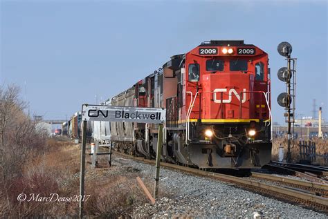 Railpictures.ca - Marc Dease Photo: CN 2009 leading train 394 knocks down the light at Blackwell 