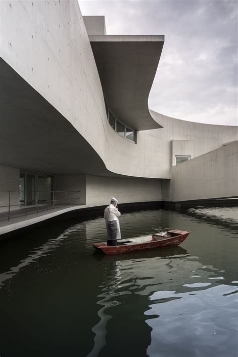 This song and its album made them write a song 'smoke on the water' in 1971, too. The Building on the Water by Alvaro Siza | METALOCUS
