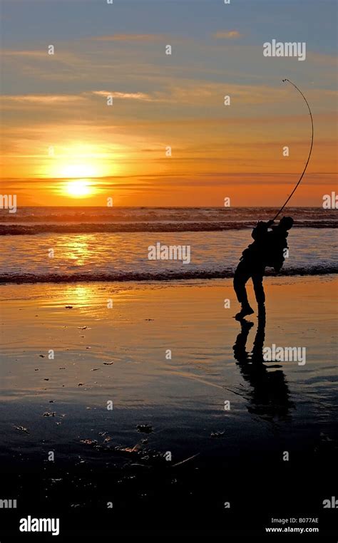 Fisherman At Sunset Stock Photo Alamy