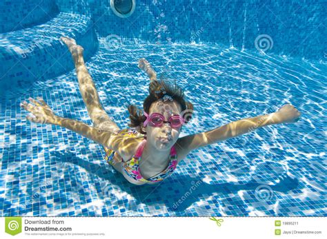 Child Swimming Underwater In Pool Stock Image Image Of Leisure