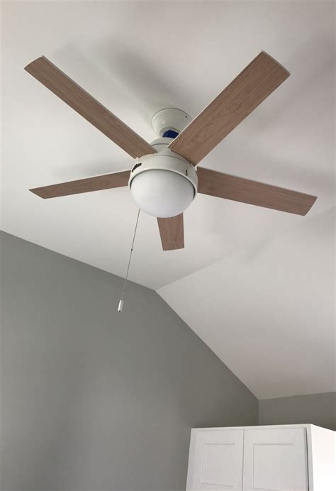 Vaulted Ceilings And Contemporary Hunter Ceiling Fans In Bedroom And