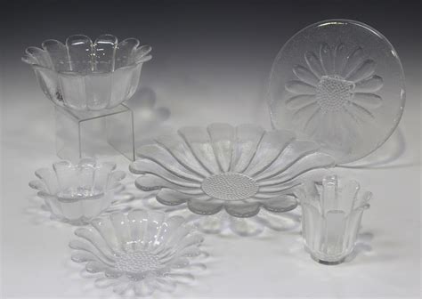 A Collection Of Dartington Daisy Pattern Glass Tablewares Comprising Two Large Serving Dishes Ten