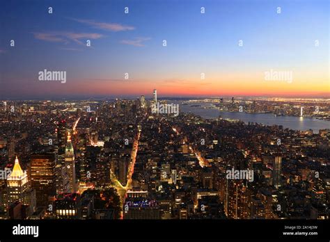 Aerial View Of New York City Lower Manhattan Skyline Illuminated At