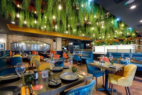 Biophilic Restaurant Interior Hanging Plants Ceiling Feature