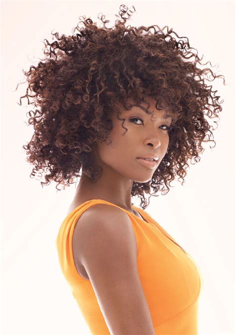 It's super chic and full of volume! How To Create The Perfect Two-Strand Twist Out Essence