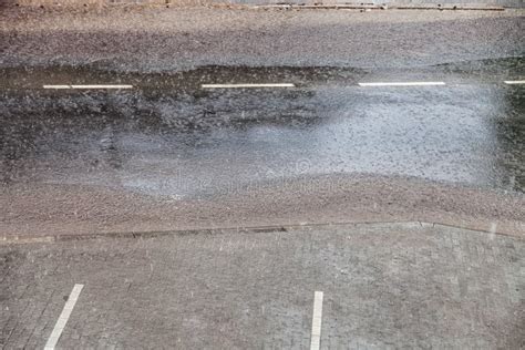 Heavy Rain Drops Falling On City Street During Downpour Stock Image Image Of Liquid Ecocide
