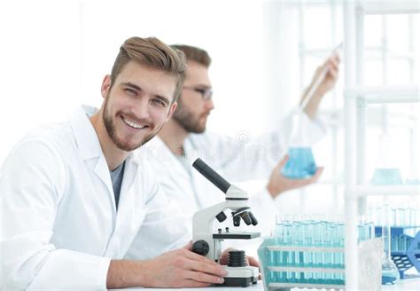 Male Researcher Carrying Out Scientific Research In A Lab Stock Image