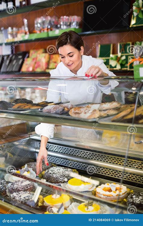 Female Seller Assisting In Choosing Dessert Stock Image Image Of