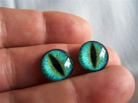 Power glass for eye suppliers. Glass eyes 14mm dragon eyes for fantasy dolls and sculpture