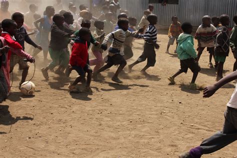 African Kids Playing Football