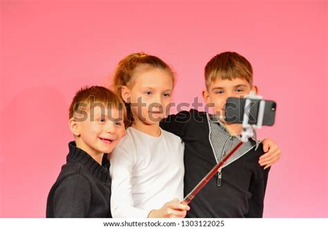 Two Boys Girl Making Selfie Studio Stock Photo 1303122025 Shutterstock