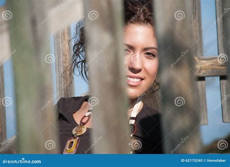 Lady Posing Behind From Wood Fence Stock Photo Image Of Cheerful