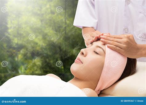 Relax Beautiful Asian Woman Facial Receiving Massage Stock Image Image Of Beautiful Closed