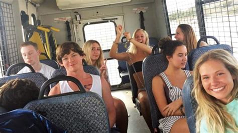 Arrested Spring Breakers Flash Big Smiles On Bus Headed To Jail