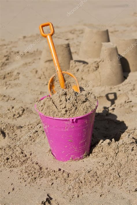 Bucket And Spade In Sand On The Beach — Stock Photo © Aoosthuizen 5948180