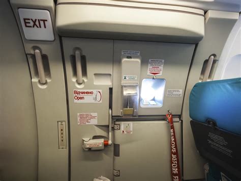 passenger opens plane emergency exit after mistaking it for bathroom au — australia s